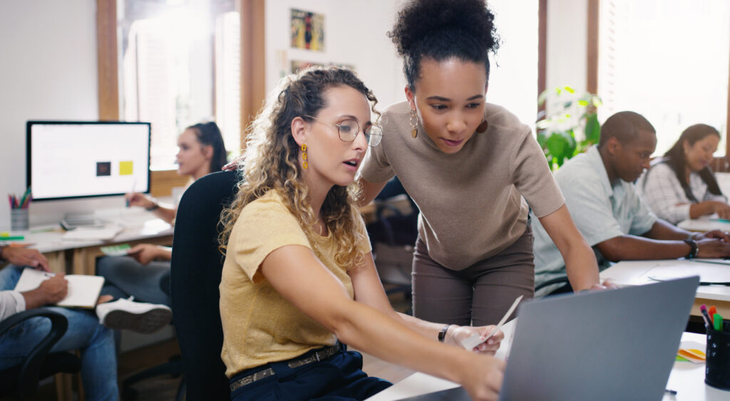 business people in training with a laptop, cross train your staff