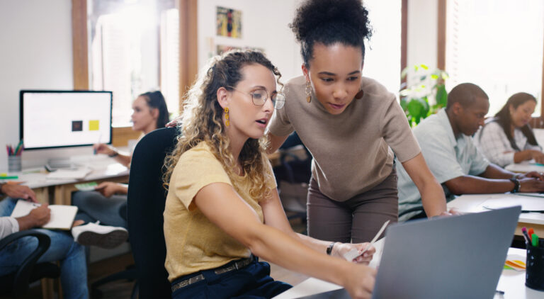 business people in training with a laptop, cross train your staff