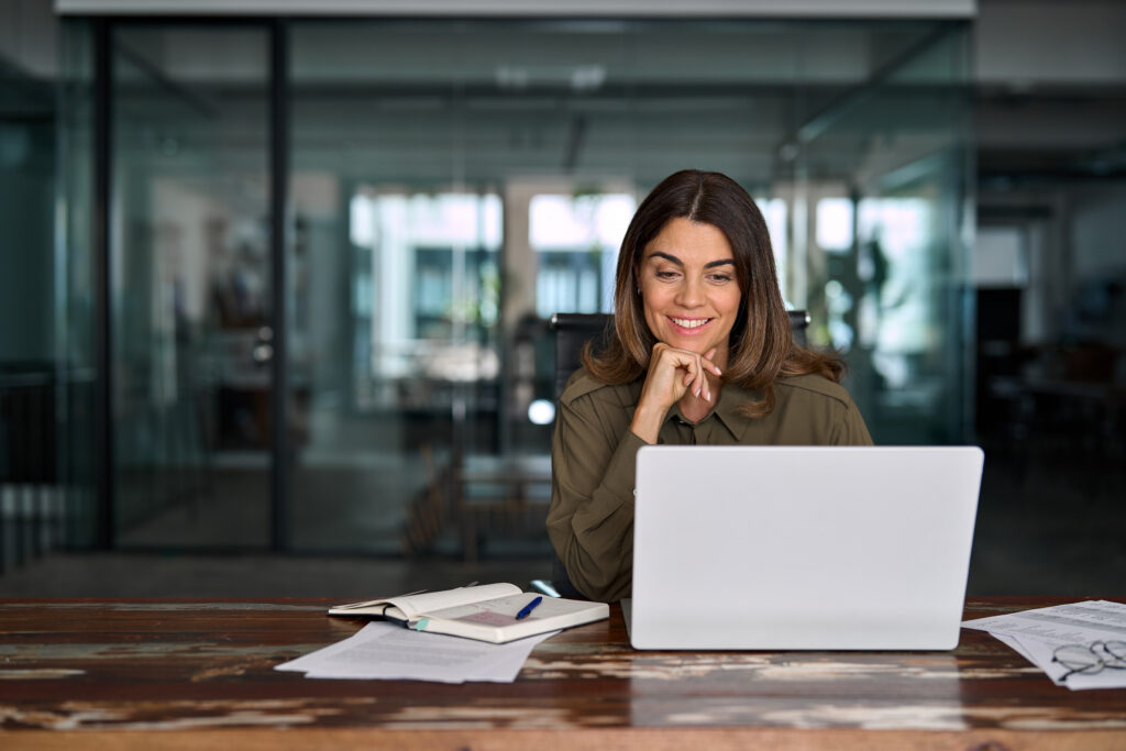 entrepreneur in office using laptop at work, entrepreneurs can make time for important projects