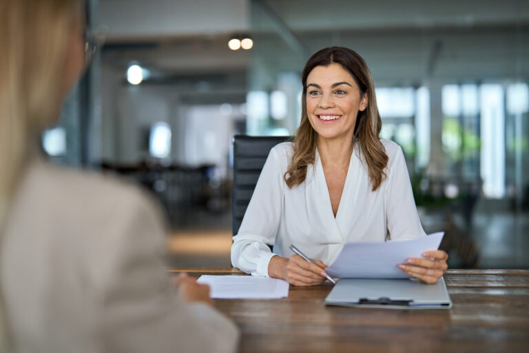 Happy mature business woman hr manager recruiter having job interview at office meeting.