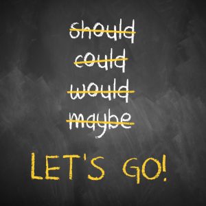 chalkboard with stroked words like could and should and "Let's go" at the bottom