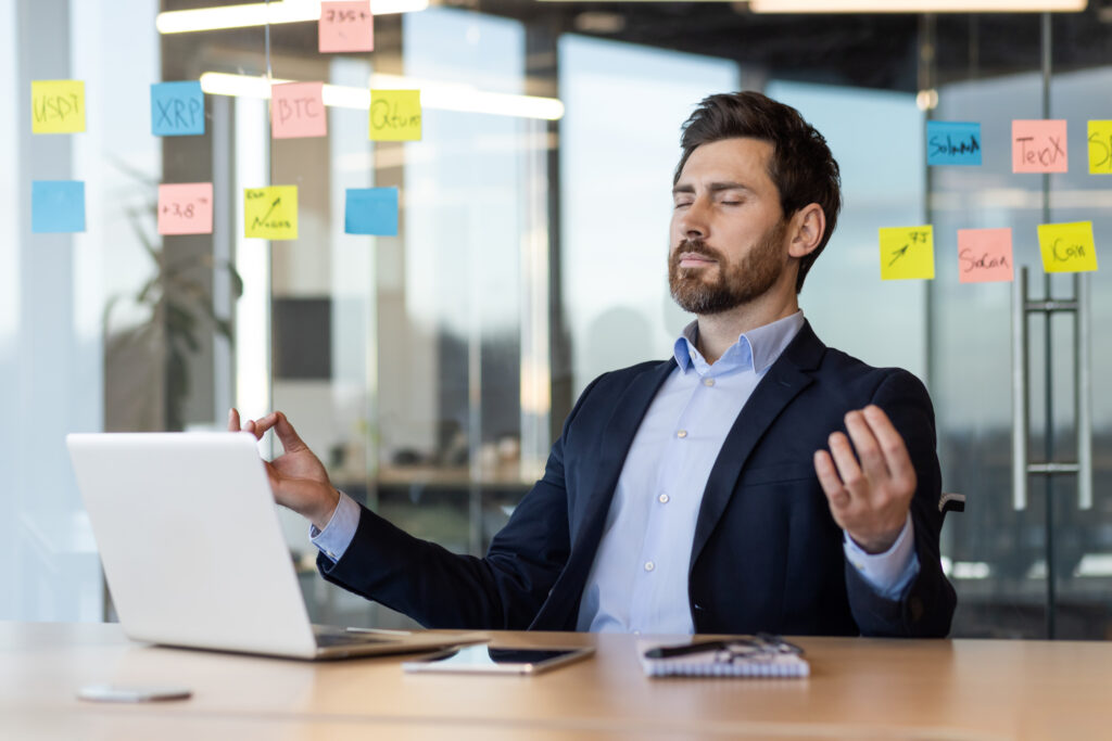Daily routine as a business owner, mindfulness, and mental clarity in busy office environment. Relaxation techniques in workplace