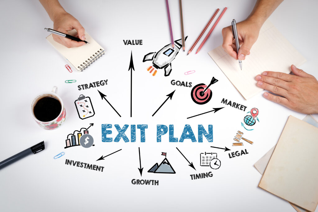 EXIT PLAN Concept. The meeting at the white office table.