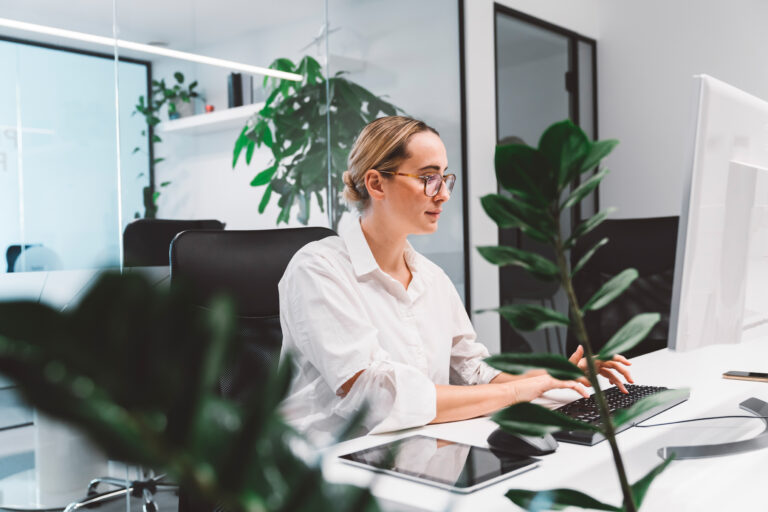 business woman working on computer in her office, business meetings or working alone, owning a task