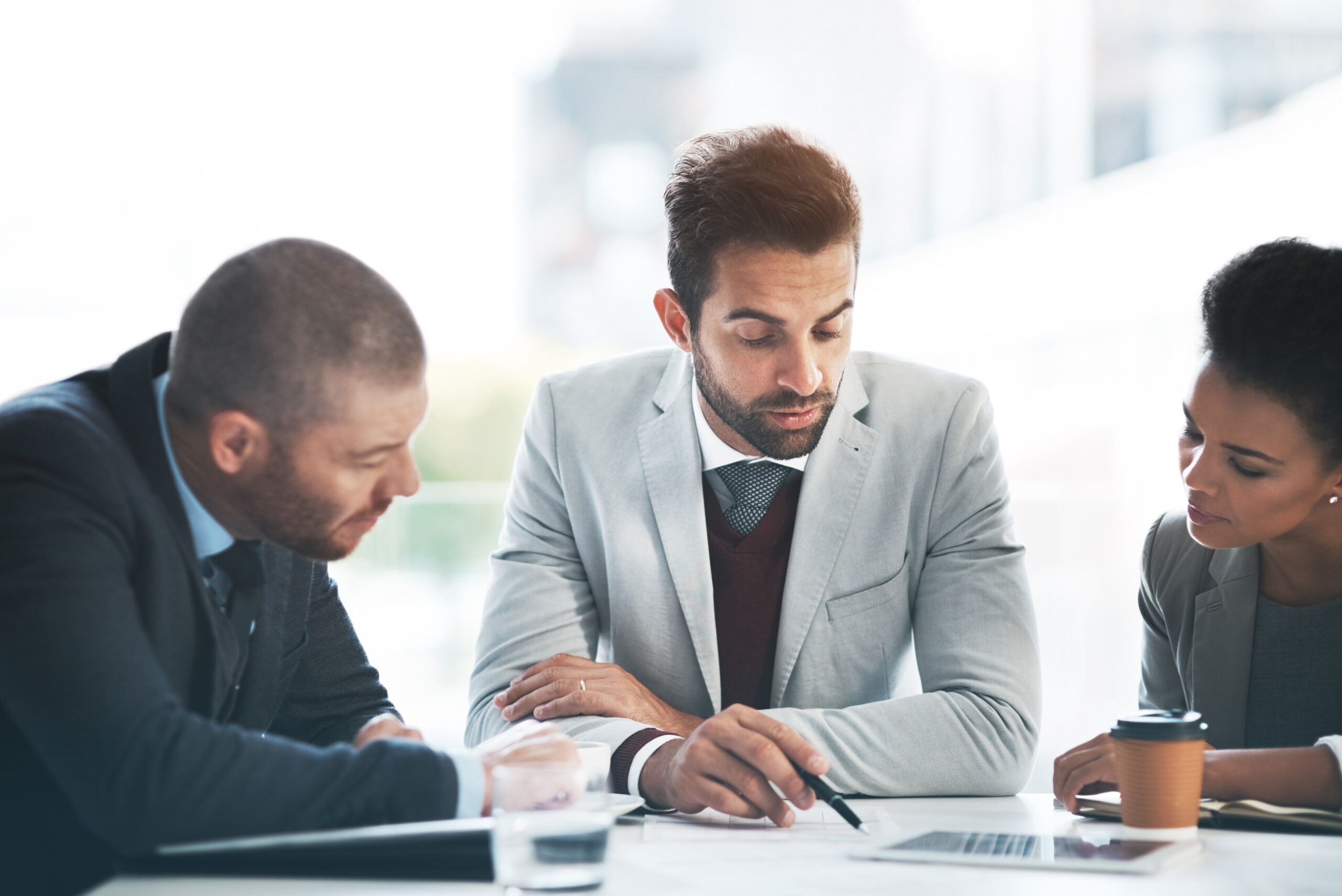 Business people, meeting for problem solving in office, teamwork for project. Planning, collaboration and partnership, talk and discussion, delegate