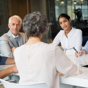 Business team in conversation, mastermind group while leadership talking, Business partners