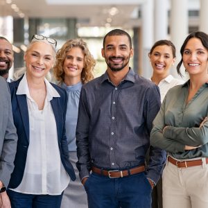 Portrait of successful group of business people standing as a team, professional service firms who increase profit margin more