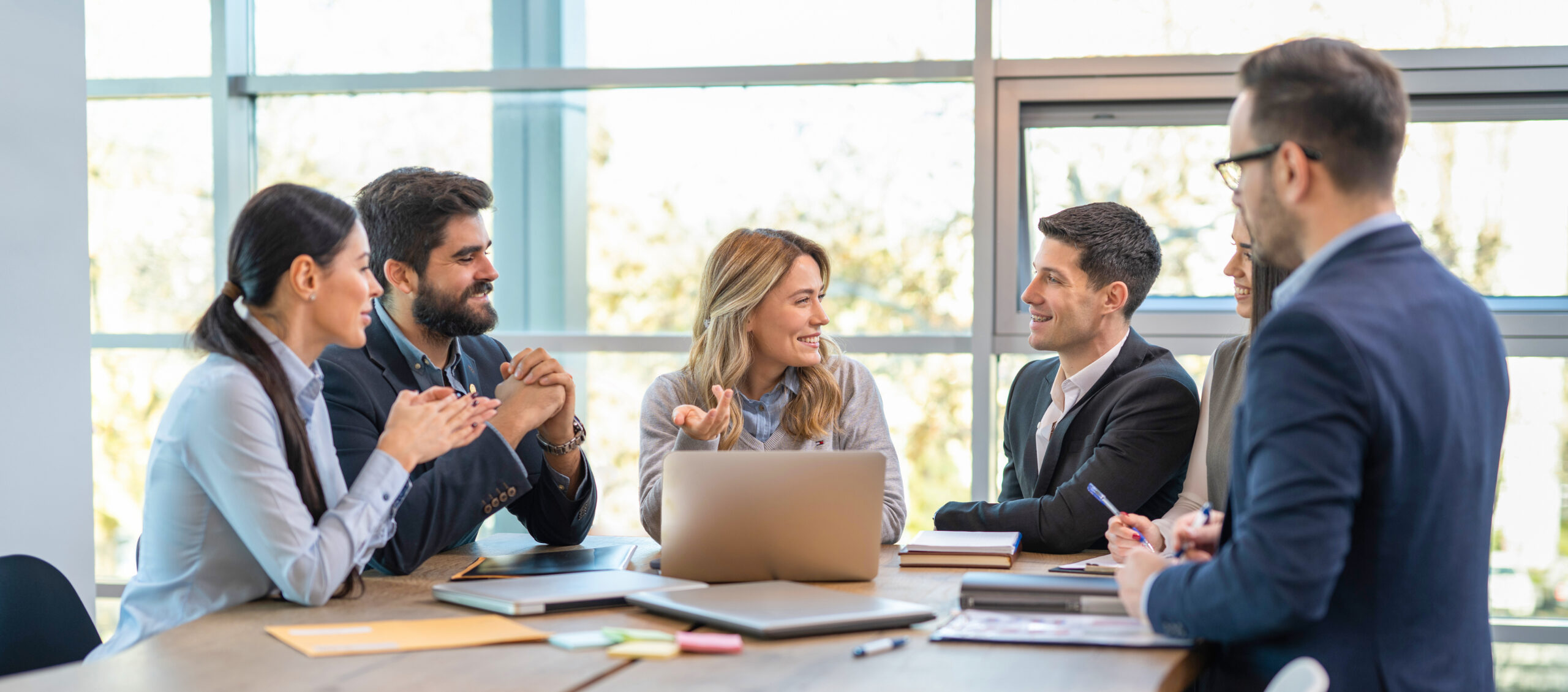 Entrepreneurs engaging in business discussions to collaboratively seek solutions and conduct strategic analysis, focus on leadership, growth, emotional intelligence, better workplace